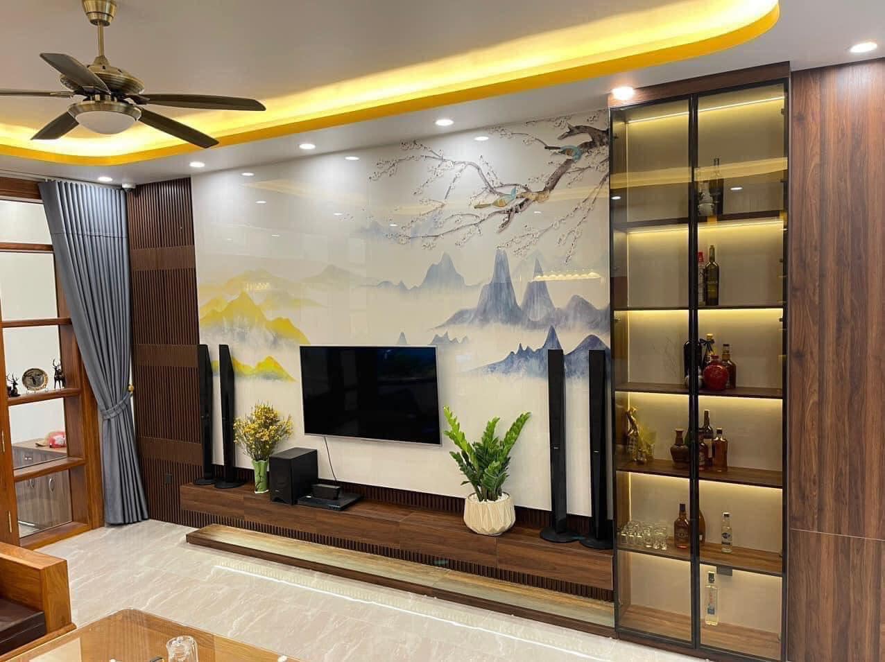 Vách tivi kết hợp tủ cánh kính hiện đại